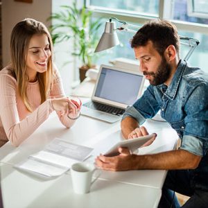 Designers sharing ideas and working together in an office.